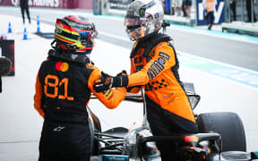 McLaren team-mates Oscar Piastri (L) and Lando Norris.
