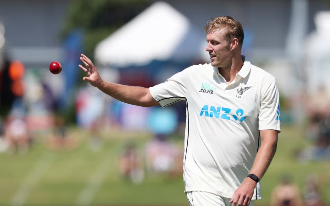 New Zealand’s Kyle Jamieson cacthes the ball during day three of the first cricket test match between New Zealand and South Africa at the Bay Oval in Mount Maunganui on February 6, 2024. (Photo by MICHAEL BRADLEY / AFP)
