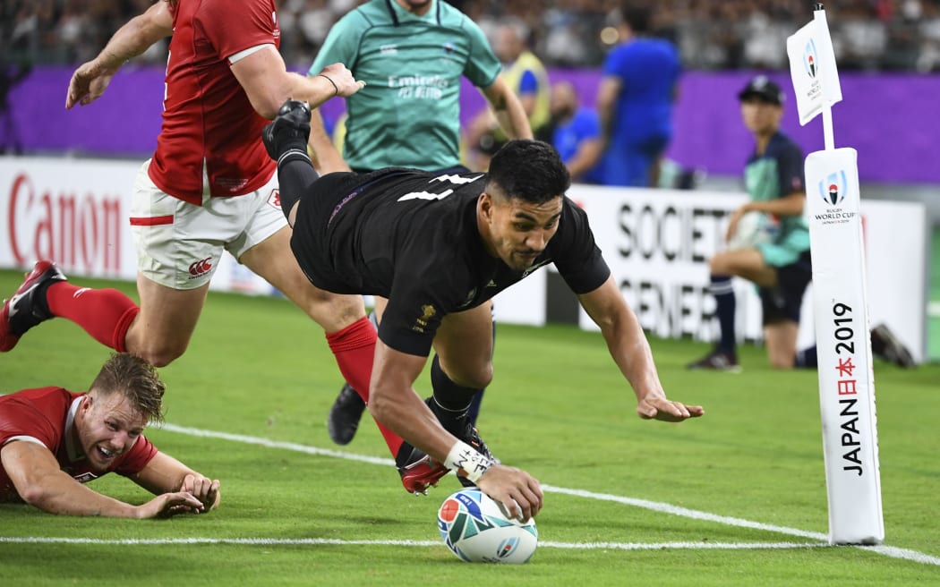 Rieko Ioane scores the All Blacks' fifth try during the Rugby World Cup pool match against Canada.