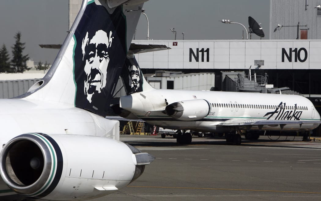 In this file photo taken on September 25, 2006 Alaska Airlines planes are seen at Seattle-Tacoma International Airport.