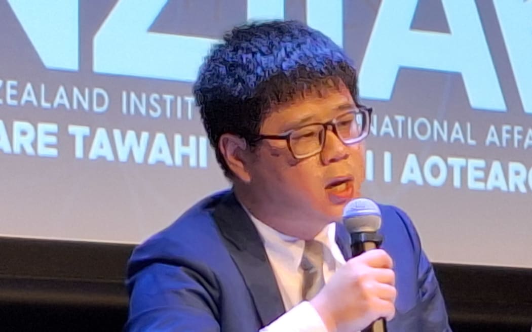 Zichen Wang of the Center for China and Globalization, speaking in Wellington.