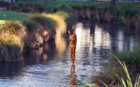 A computer-generated image of the sculpture in its new home.
