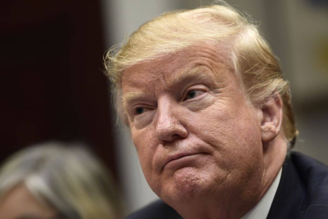 President Donald Trump listens during a meeting with Hispanic pastors in the Roosevelt Room of the White House in Washington, Friday, Jan. 25, 2019. (AP Photo/Susan Walsh)