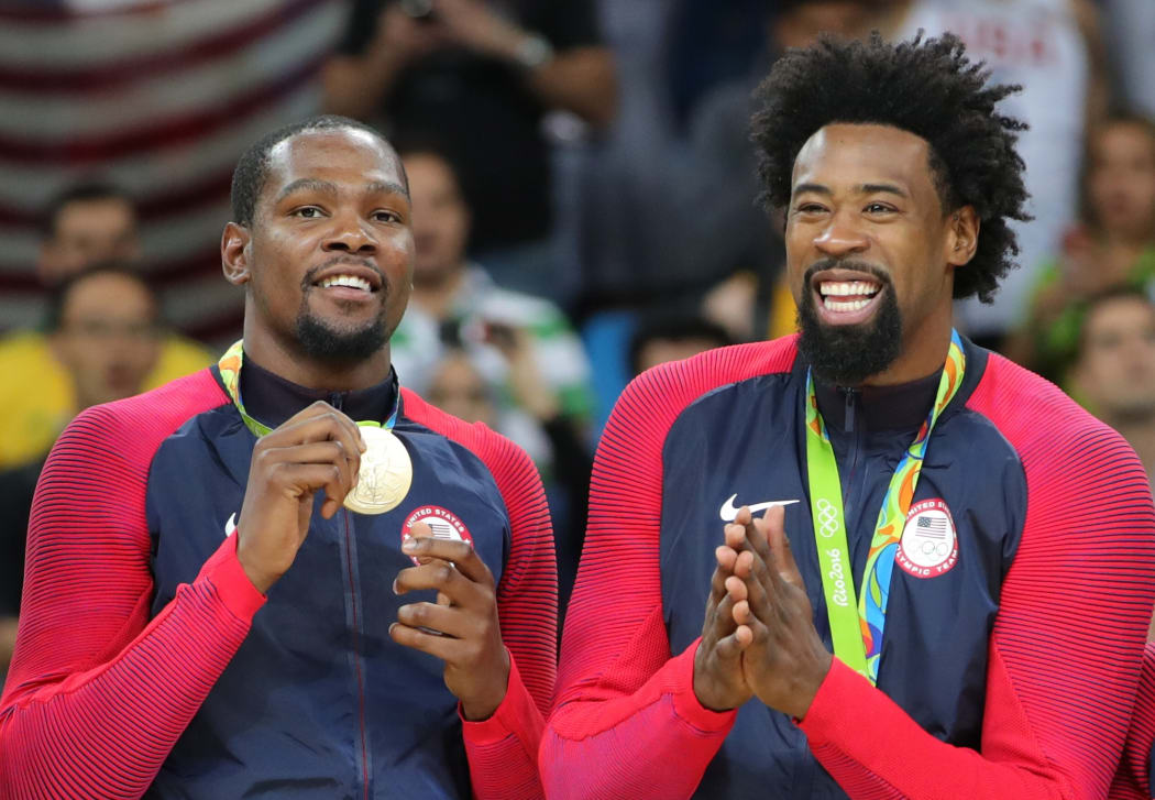 Kevin Durant and DeAndre Jordan from USA basketball team show off their gold medals at Rio Olympics
