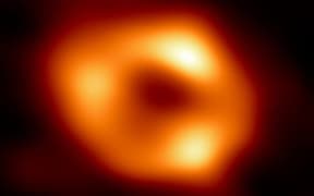 A blurry orange blob.