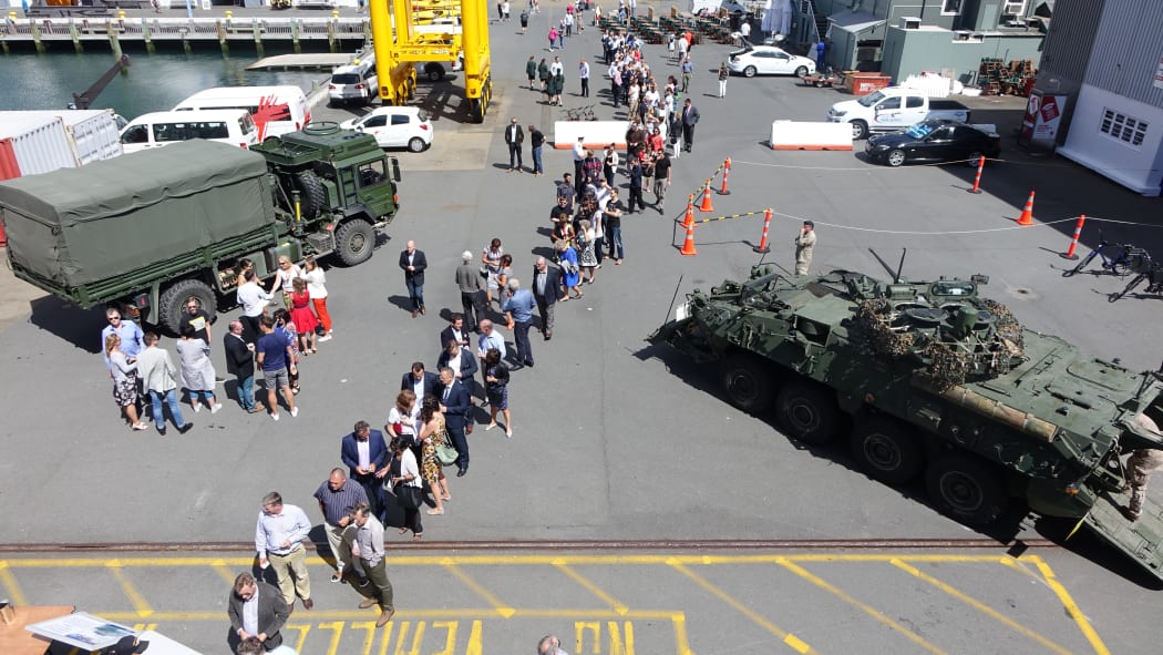 Hundreds of people line up for a fish and chip lunch onboard the HMNZS Canterbury.