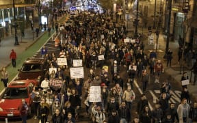Anti-Trump Demonstrators protest on November 9, 2016 in Chicago, Illinois.