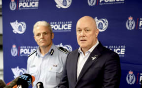 Police Commissioner Richard Chambers and Prime Minister Christopher Luxon.