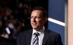 Peter Thiel, co-founder of PayPal, walks on stage to deliver a speech during the evening session on the fourth day of the Republican National Convention on July 21, 2016 at the Quicken Loans Arena in Cleveland, Ohio.