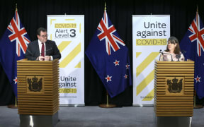 Director of Public Health Dr Caroline McElnay speaks to media while Finance Minister Grant Robertson looks on during a Covid-19 update conference at Parliament on May 08, 2020.
