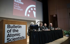 Scientists from the group Bulletin of the Atomic Scientists speak during a press conference after updating the Doomsday Clock.