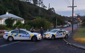 A cordon remains in place at Sommerville Street in Dunedin in connection to the Churchchurch terror attack.