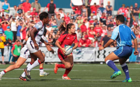 Fijian referee James Bolabiu in action on the Women's Sevens World Series.
