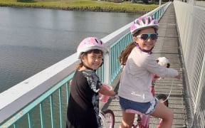 Kara (6) and Kayla (8) Jones are some of many who have enjoyed cycling through Whakatane's safer streets during the nationwide Covid-19 lockdown.