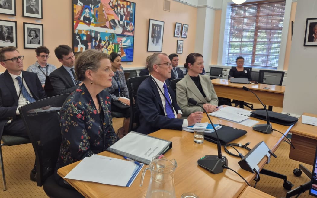 Public Service Commissioner Sir Brian Roche and his deputy chief executives Heather Baggot (right) and Rebecca Kitteridge (left)  fronted MPs to answer questions about the PSC's annual report.