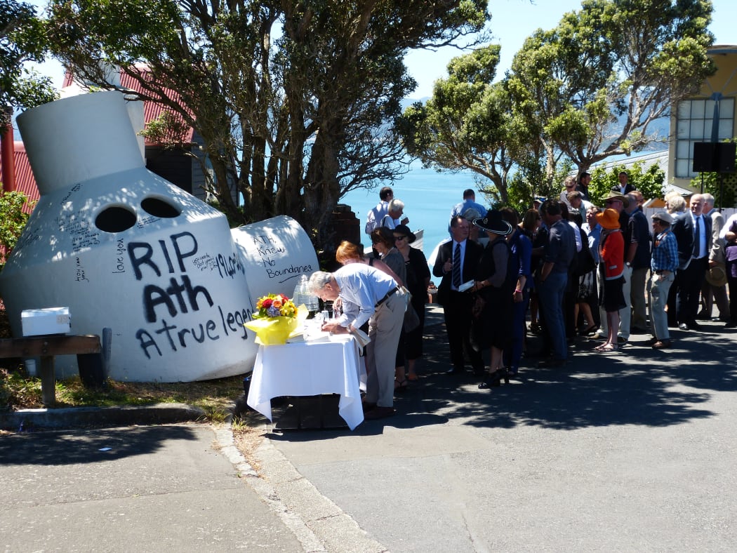 People pay their respects and leave messages for Sir Ian Athfield.