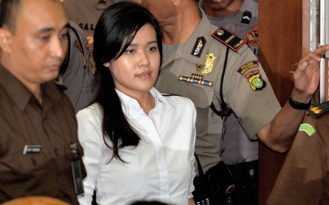 Indonesian murder suspect Jessica Kumala Wongso (C) enters the courtroom prior to her trial at the Central Jakarta court.