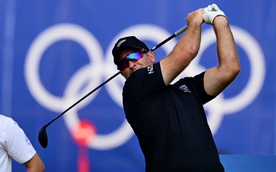 New Zealand's Ryan Fox tees off in round 2 of the men’s golf individual stroke play of the Paris 2024 Olympic Games at Le Golf National in Guyancourt, south-west of Paris on August 2, 2024. (Photo by John MACDOUGALL / AFP)