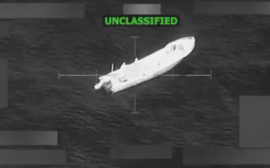 This screengrab taken from a video posted by Defence Secretary Pete Hegseth, shows a boat shortly before it is struck by a missile on 9 November.
Mandatory Credit:	Secretary of Defence Pete Hegseth via CNN Newsource