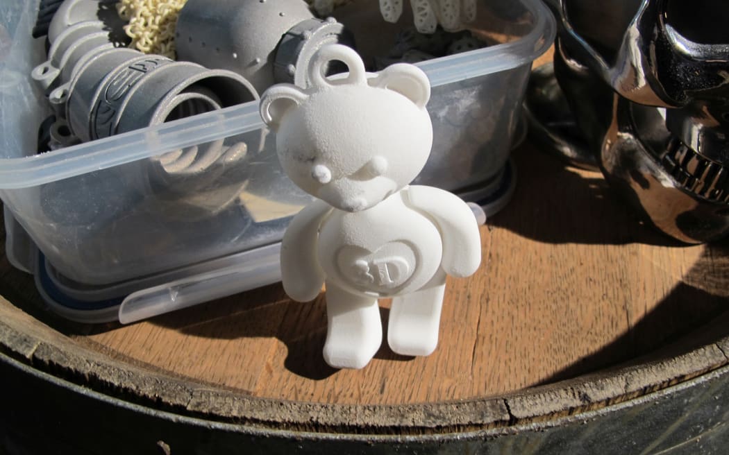 A tiny 3D-printed teddy bear