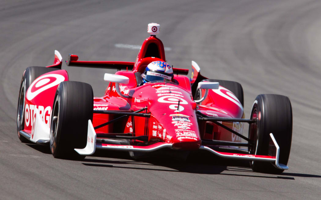 The New Zealand motor racing driver Scott Dixon.