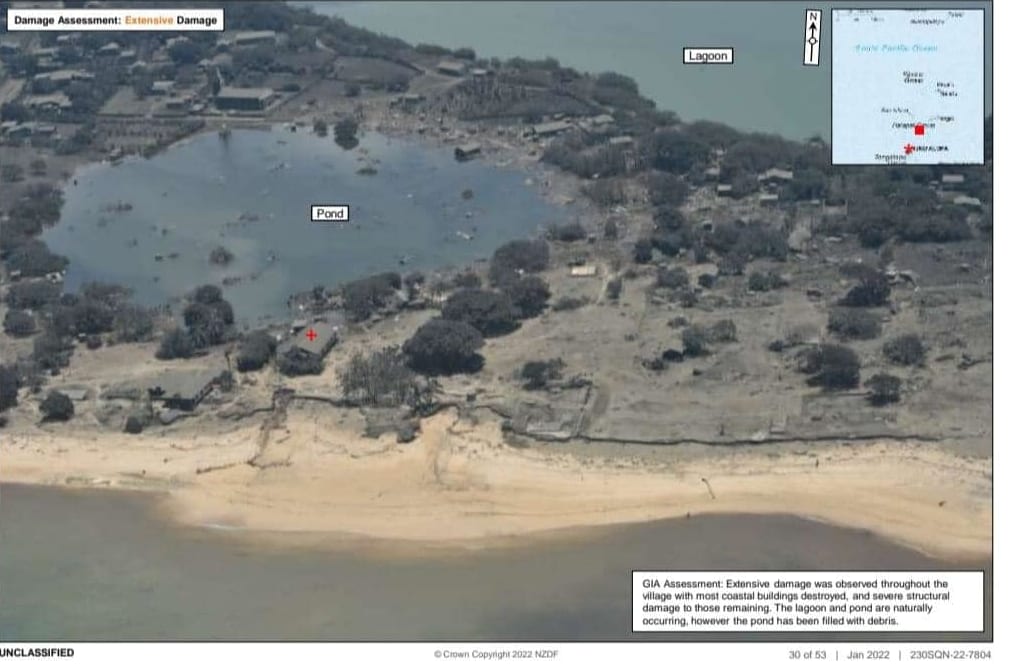 Nomuka Island in Ha'apai, Tonga, as seen from an NZDF P-3 Orion reconnaisance flight after the eruption of Hunga Tonga-Hunga Ha'apai. The image caption says extensive damage was  observed through the village with most coastal buildings destroyed.
