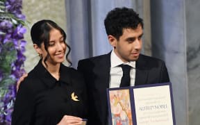 OSLO, NORWAY - DECEMBER 10: Nobel Peace Prize laureate Iranian activist Narges Mohammadi's daughter Kiana Rahmani and son Ali Rahmani attend the Nobel Peace Prize ceremony at Oslo City Hall on December 10, 2023 in Oslo, Norway. (Photo by Rune Hellestad/Getty Images)