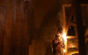 Restorations have begun on the ancient tomb in Jerusalem where Christians believe Jesus was buried - the most extensive works in more than two hundred years.