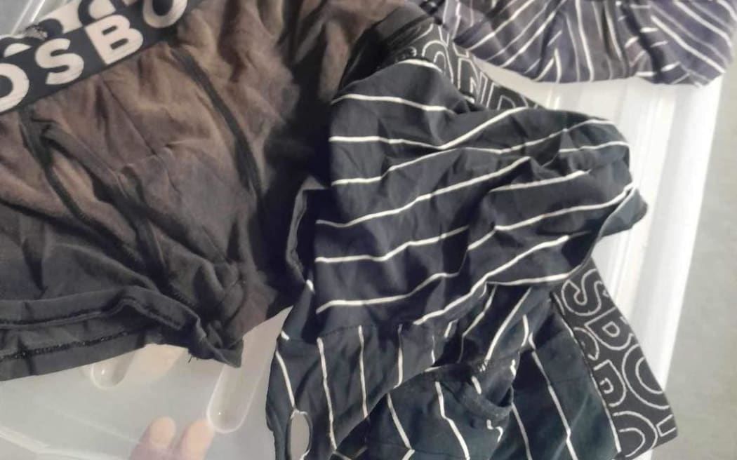 Three pairs of dirty, used and torn underwear donated to South Auckland charity - The Aunties, which supports victims of domestic violence.