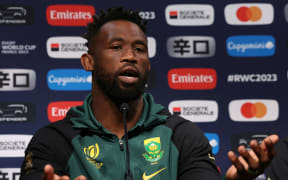 South Africa's flanker Siya Kolisi speaks during a press conference in Presles, north of Paris, on October 26, 2023, ahead of the France 2023 Rugby World Cup final against New Zealand. (Photo by Emmanuel Dunand / AFP)