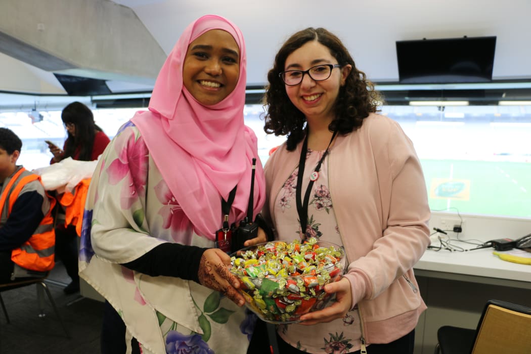 One big family, NZEid core volunteers Farhanah and Farah.