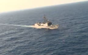 An image grab taken from a handout video released by the Egyptian Defence Ministry on May 20, 2016 shows the Egyptian military taking part in a search mission in the Mediterranean Sea for the remains of an EgyptAir plane which crashed.