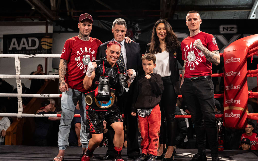 Mea Motu with family and friends following her win in the co-main event of Peach Boxing's Pro-Am fight in February.