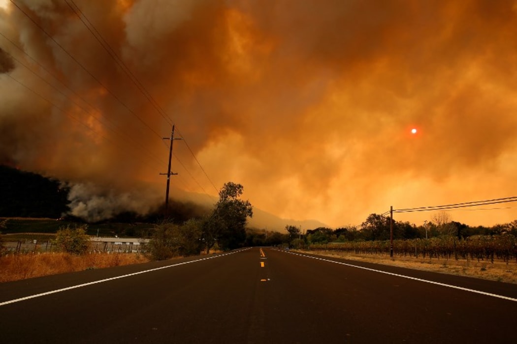 A view of San Francisco gulf as smoke covers the sun as a wildfire from the Santa Rosa and Napa Valley moves through the area in California.