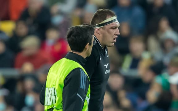 Brodie Retallick of New Zealand is injured and forced to leave the field. Third Test against Ireland 2022.