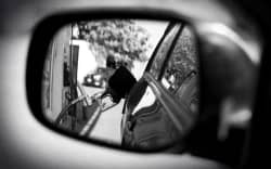 Composite of car mirror and fuel pump.