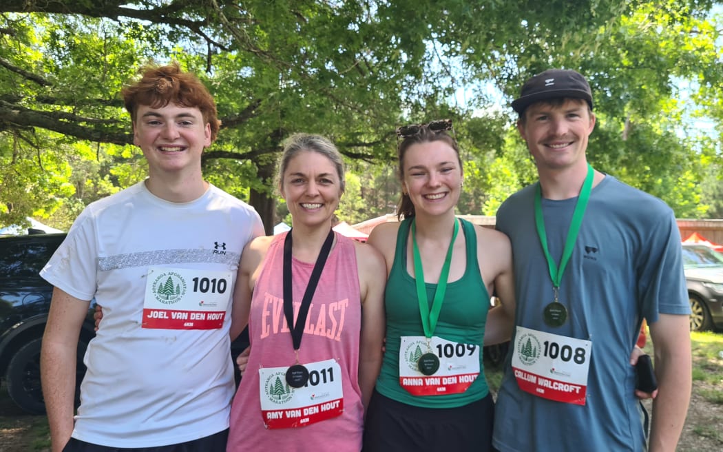 The Van Den Hout family (from left) Joel, 20, with his mother, Amy, 50, and sister, Anna, 22, and Anna's boyfriend, Callum Walcroft, took part in the Aotearoa Afghanistan Marathon on 16 November, 2024.
