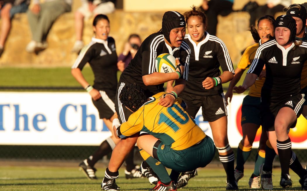 Linda Itunu is tackled by Alana Thomas during a Wallaroos vs Black Ferns test in 2008.