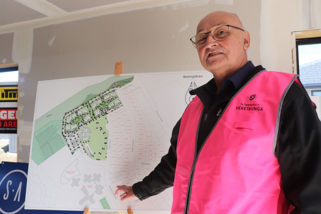 Te Taiwhenua o Heretaunga chairman Mike Paku with the plans for the Waingākau development.