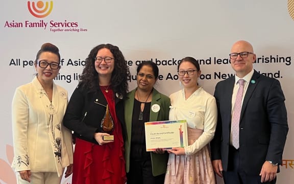 Thriving at Crossroads with mental health minister Matt Doocey (right) and Kelly Feng (left) from the Asian Family Services at the inaugural Flourishing Asian Communities and Workforce Symposium hosted by the Asian Family Services in Auckland on Friday, 13 March, 2026.