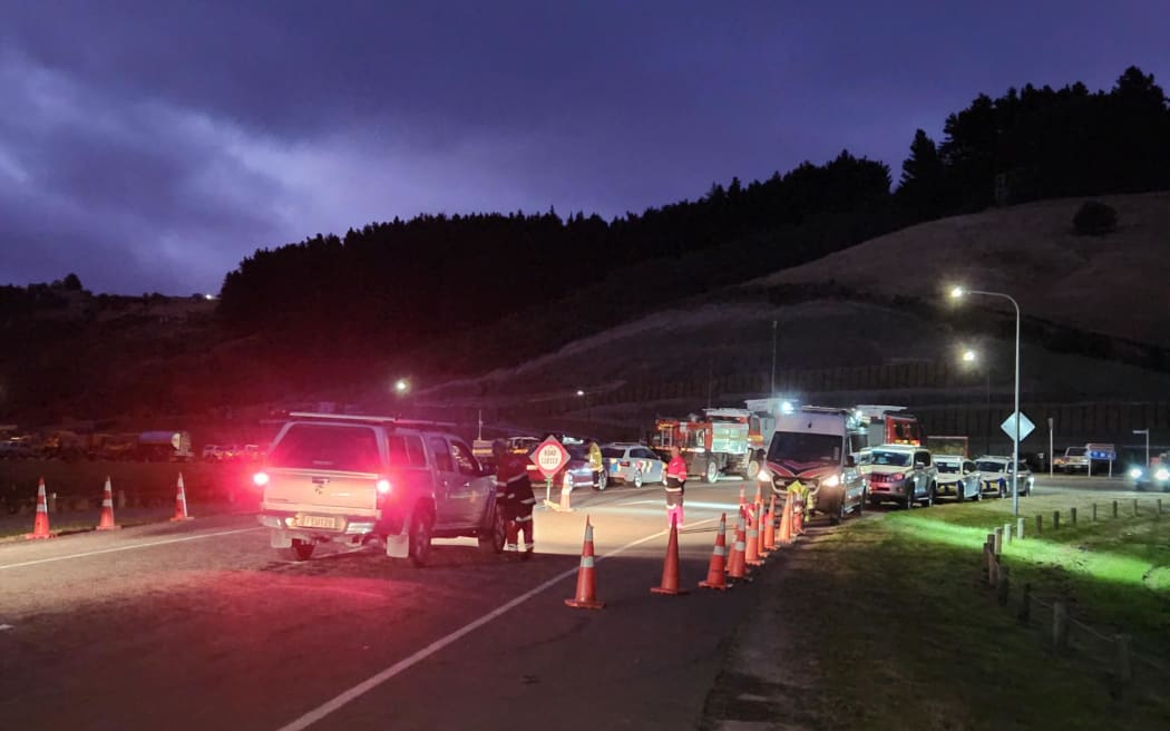 The Worsleys Road cordon for the Port Hills fire early on Saturday morning, 17 February 2024.
