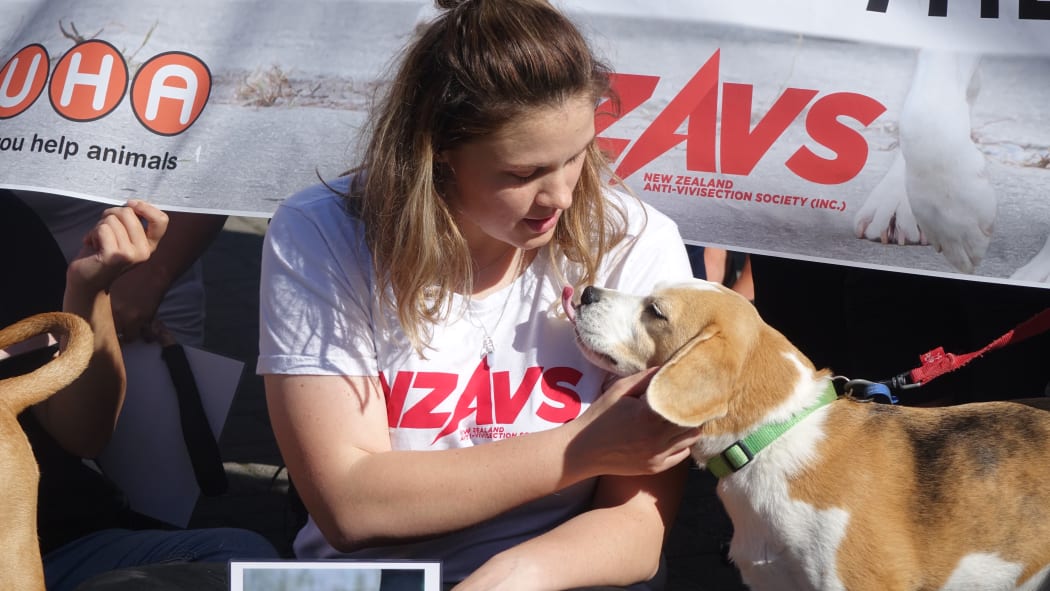 Anti-Vivisection Society spokesperson Cressida Wilson with a canine protester