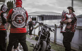 Davide Conti's photo series 'The Patch' captures members of the Mongrel Mob in Hawke's Bay in deliberate stances of collective strength as well as disarming informality.