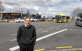 Glen Crowther of Sustainable BOP trust, standing on Cameron Rd, the main drag through Tauranga.