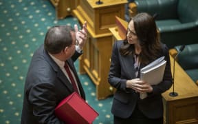 Grant Robertson and Prime Minister Jacinda Ardern enter The House to deliver Budget 2020.
