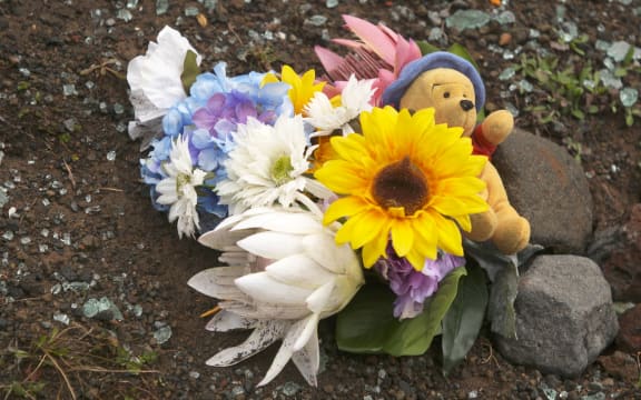 Flowers mark the spot where Hannah Francis died after a Ruapehu Alpine Lifts bus crashed while descending the mountain.