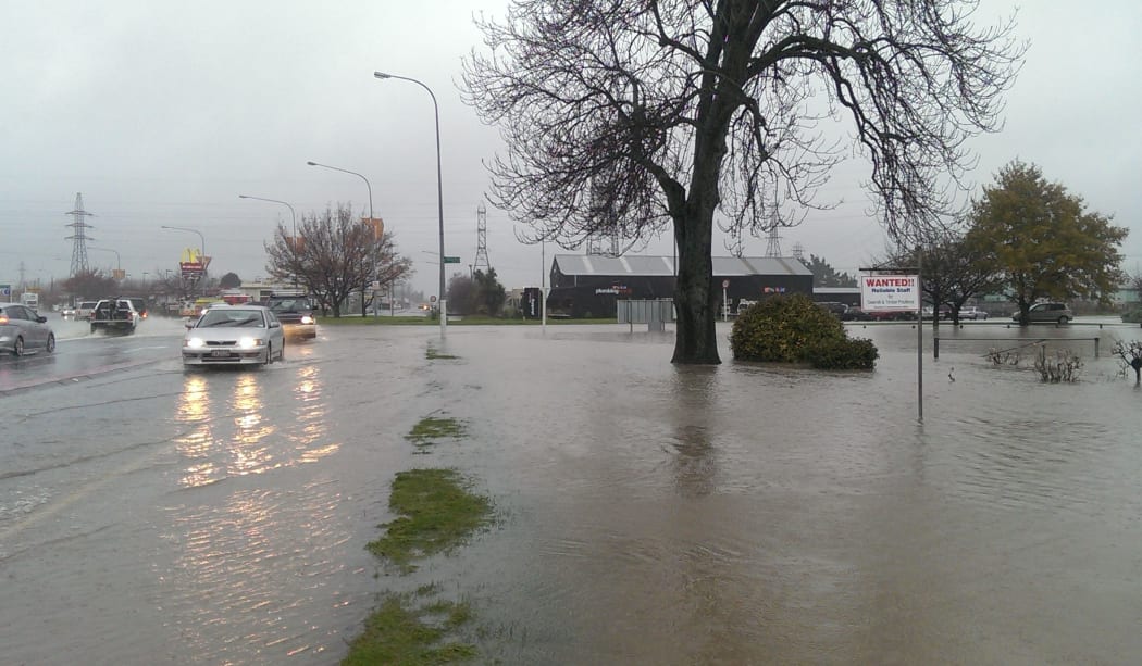 Traffic slowed as surface flooding increased in Rangiora.