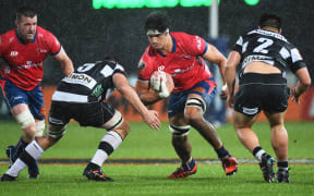 Pari Pari Parkinson on the burst for Tasman.