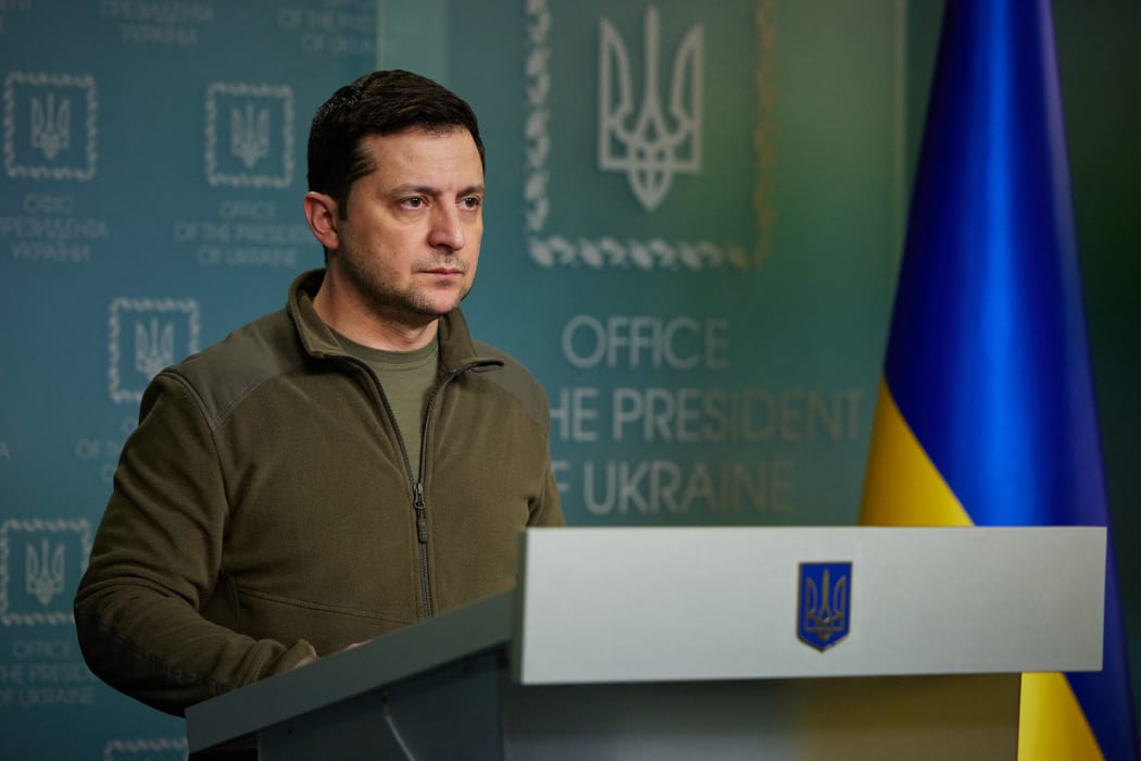 Ukrainian President Volodymyr Zelensky addresses the nation in Kyiv early on February 25, 2022.