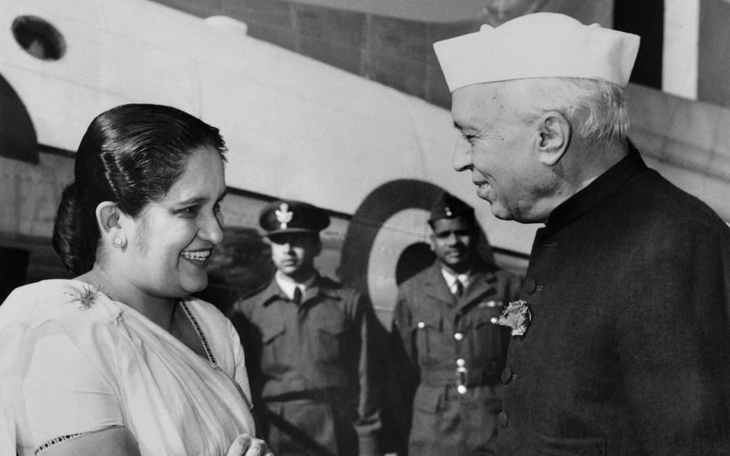 Indian Prime minister Jawaharlal Nehru, right, welcomes Prime Minister of Sri Lanka Sirimavo Bandaranaike at Safdarjung airport in New Delhi on 3 January 1961. (Photo by PUNJAB / AFP)